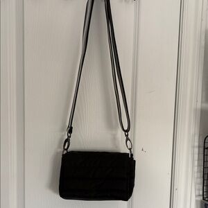 Black Quilted Crossbody Bag
Think Royln